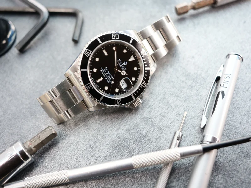 Rolex submariner date ref 16610 in factory stickers